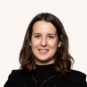 a woman with brown hair wearing a black shirt